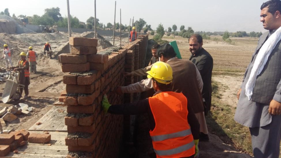 LOCAL MONITORS PREVENT USE OF LOW QUALITY BUILDING MATERIAL AT A SCHOOL AND A CLINIC IN JALALABAD